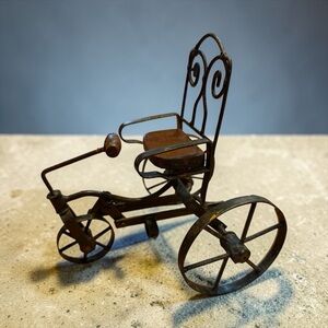 Vintage or antique-style miniature tricycle. “Salesman sample”